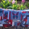 Housse coussin papillon rouge et bleu